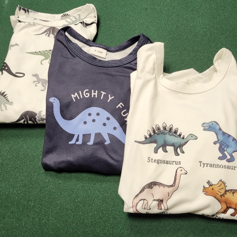 Three dinosaur long sleeve onesies/bodysuits